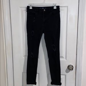 High-rise ripped skinny jeans